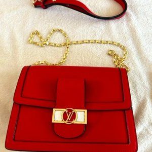 Red Purse with black trim and a little bling